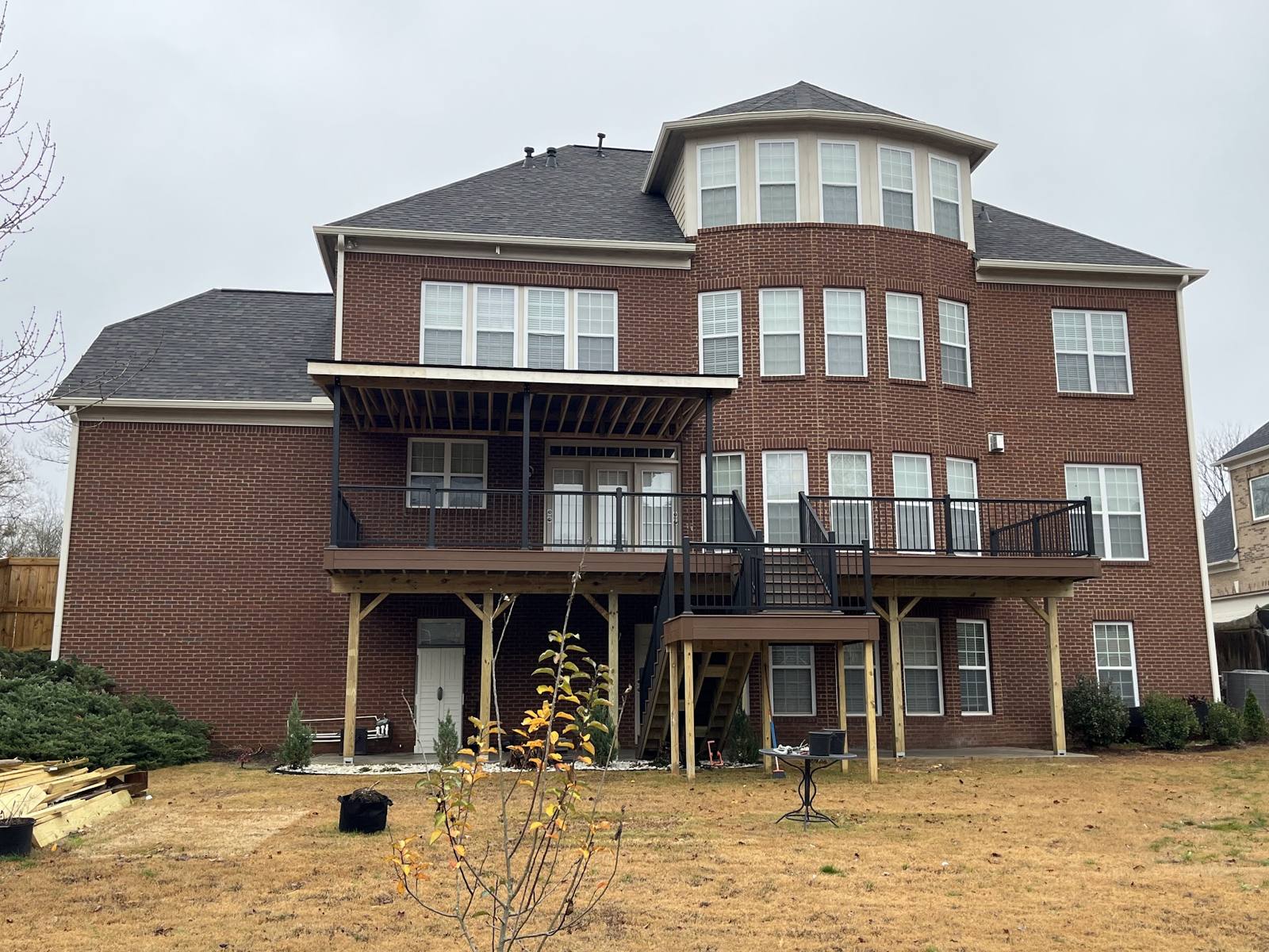 Large three-story brick house, rear roofline